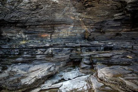 Multistory layered rough and sedimentary rocks Stock Photos