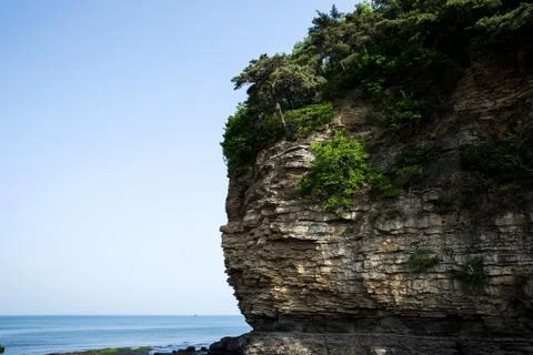Multistory layered rough and sedimentary rocks Stock Photos