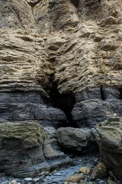 Multistory layered rough and sedimentary rocks Stock Photos