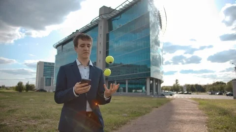 Multitasking concept. One hand juggling businessman working on smartphone Stock Footage 119961850