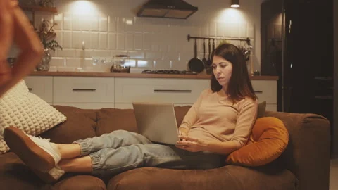 Multitasking Mom Balancing Work and Children Video stock 268496027