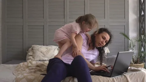 A multitasking mom working remote is stressed out Stock Footage 133864126