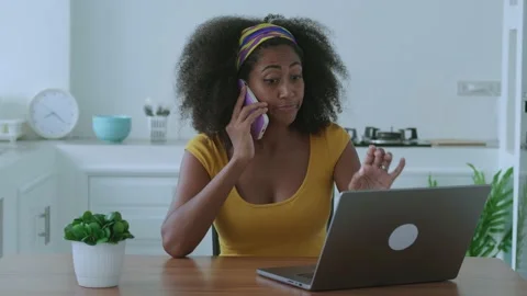 Multitasking multi-ethnic young woman, freelancer, copywriter working remotely Stock Footage 219913615
