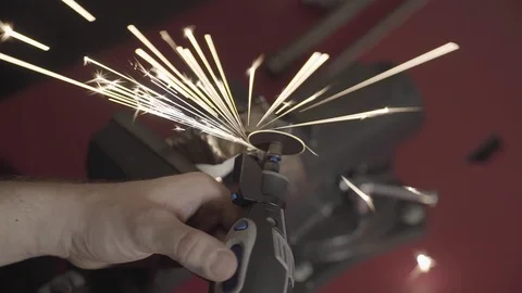 Multitool in action with sparks close up Stock Footage 125445983