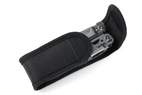 Multitool in a case on white Stock Photos