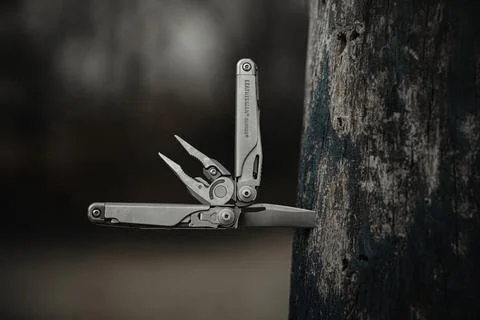 Multitool laserman serdch is a cool and necessary irreplaceable tool Stock Photos