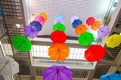A multitude of colorful umbrellas Stock Photos