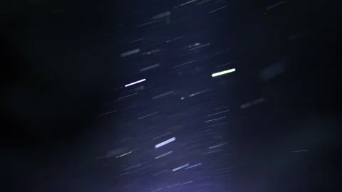 A multitude of dust specks drift through the air,4k 스톡 동영상 306419422