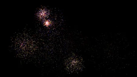 Multitude of isolated multicoloured fireworks in a loop Stock Footage 258212943