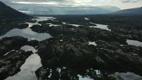 A multitude of small Lakes in an open Valley, Mystery, Aerial Stock Footage 289477337