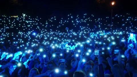 A multitude of unrecognizable spectators in the concert hall Stock Footage 139752805