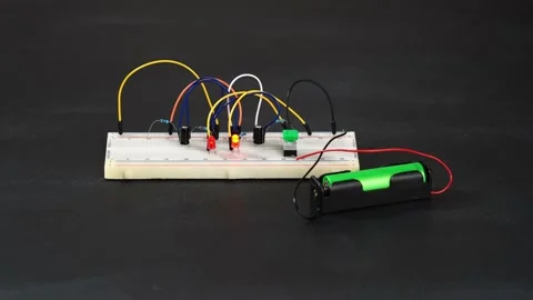 Multivibrator assembled on breadboard board. Stock Footage 156696704