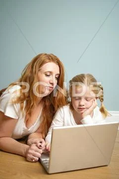 Mum And Daughter On Computer - Stock Image - Everypixel