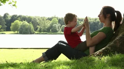 Mum and son hand clapping3 Stock Footage 18151133