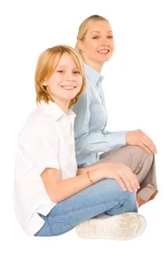 Mum and son sat on the floor smiling isolated on white background Stock Photos