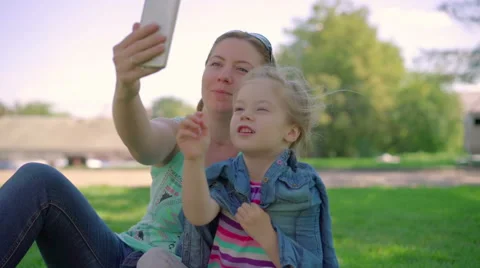 Mum with a small daughter do selfie Stock Footage 68903729