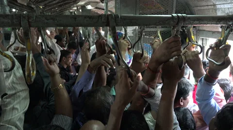 Mumbai commuter train inside, crowded, passengers, busy, transport, India Stock Footage