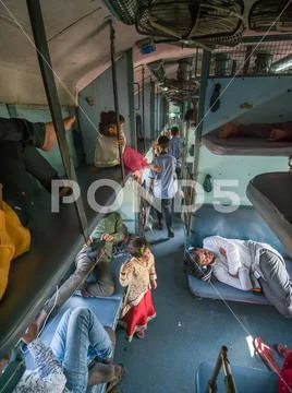 Mumbai, India - December 17, 2019: In the carriage of an Indian train with Stock Photos