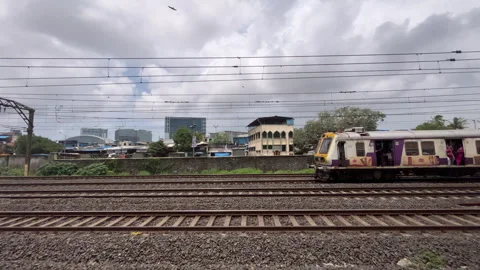 Mumbai Local Train Passing Through Station on September 10, 2024 Stock Footage 285715124