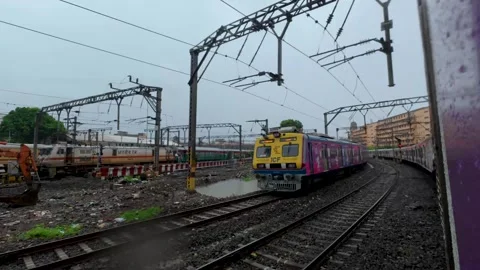 Mumbai local train on a rainy day in India Stock Footage 338047151