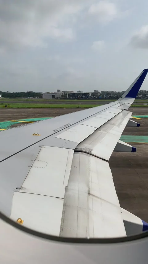 Mumbai plane take off window view 03 Stock Footage
