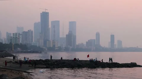 Mumbai Skyline View and the beach during a smoggy sunset Stock Footage 167624809