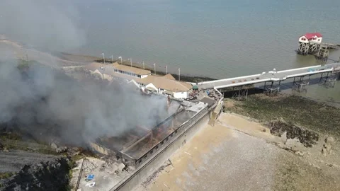 Mumbles pier fire from Drone Stock Footage 208078346