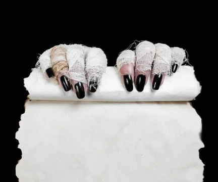 Mummy in hands keeps manuscript Stock Photos