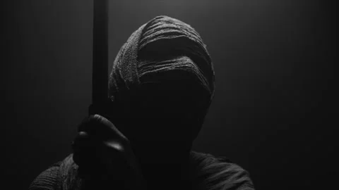 A Mummy holding onto something 스톡 동영상 259611161