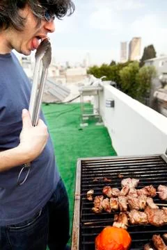 Munching off the grill Stock Photos