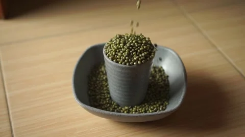 Mung beans falling down Stock Footage 250446409
