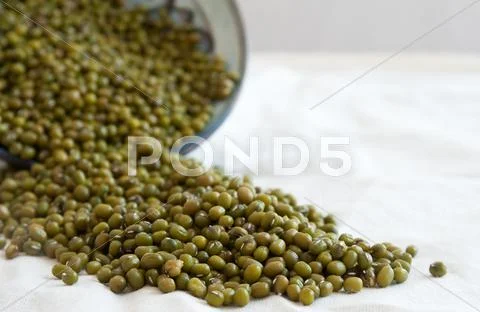 Mung beans spilling Stock Photos
