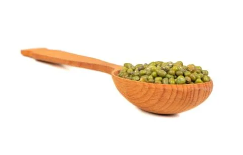Mung beans in spoon Stock Photos