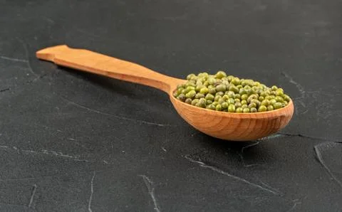 Mung beans in spoon Stock Photos