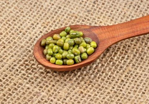 Mung beans in spoon Stock Photos