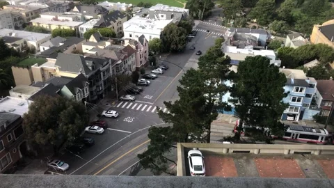 Muni passenger rail passes through Parnassus Heights. Stock Footage 256498437