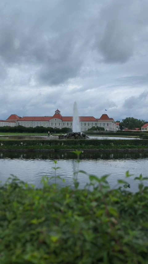 Munich 31 aug 2023, fountain is front of Nymphenburg Palace in cloudy day Video stock 259052353