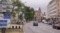 Munich City Center Cars Passing Traffic People Crossing Busy Road Direction Sign HD Footage