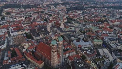 Munich in the evening flight on a city with a view on the roofs of houses and Stock Footage 95585347