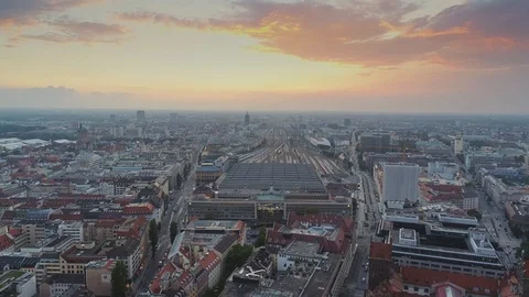 Munich in the evening flight on a city with a view on the roofs of houses and Stock Footage 95585959