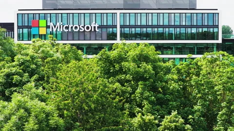 MUNICH, GERMANY - APRIL 08, 2025: Microsoft logo at the company office building Stock Footage 321357408