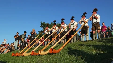Munich, Germany - Aug 10, 2022: Alphorn player at the European Championships Stock Footage 205401089