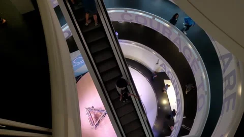 Munich, Germany, August 25, 2024:Mall Interior Featuring Dramatic Escalator Stock Footage 295872814