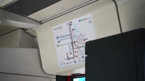 MUNICH, GERMANY – AVV transit route map inside train Stock Footage 343832574