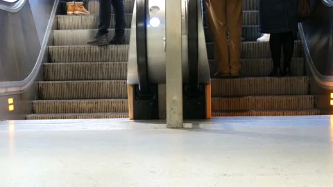 Munich, Germany - December 2, 2018: People climb on the steps of escalator. Stock Footage 101123917