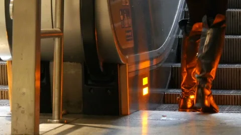 Munich, Germany - December 2, 2018: People climb on the steps of escalator. Stock Footage 101133145