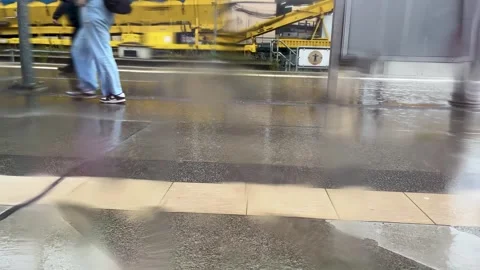 Munich, Germany, July 29, 2025: Rainy Day at Train Station With Workers Stock Footage 314492599