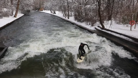 MUNICH, GERMANY - surfer riding an artificial wave Stock Footage 102846650