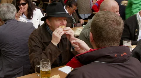 Munich Man Eating Sandwich Video stock 43386232
