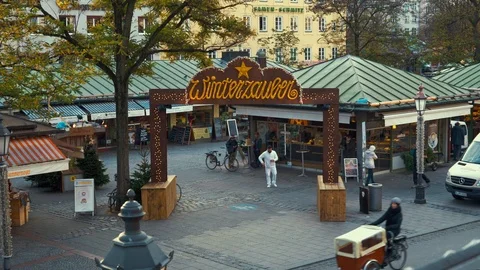 MUNICH - NOVEMBER 18: Locked down real time establishing shot of the city market Stock Footage 126064560